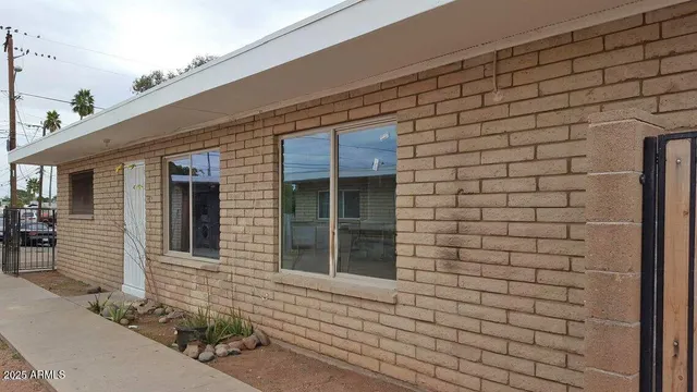 a front view of a house with an empty space
