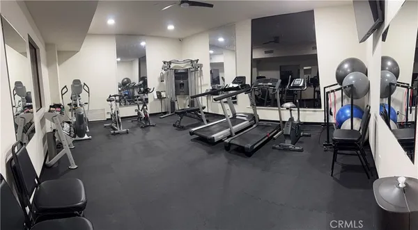 a view of a room with gym equipment