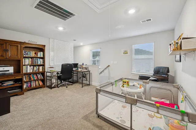 a kids room with furniture and a gym equipment