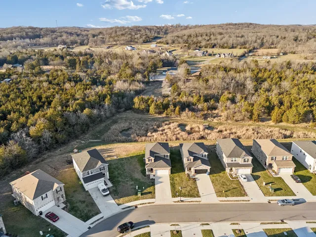 an aerial view of residential building with parking space
