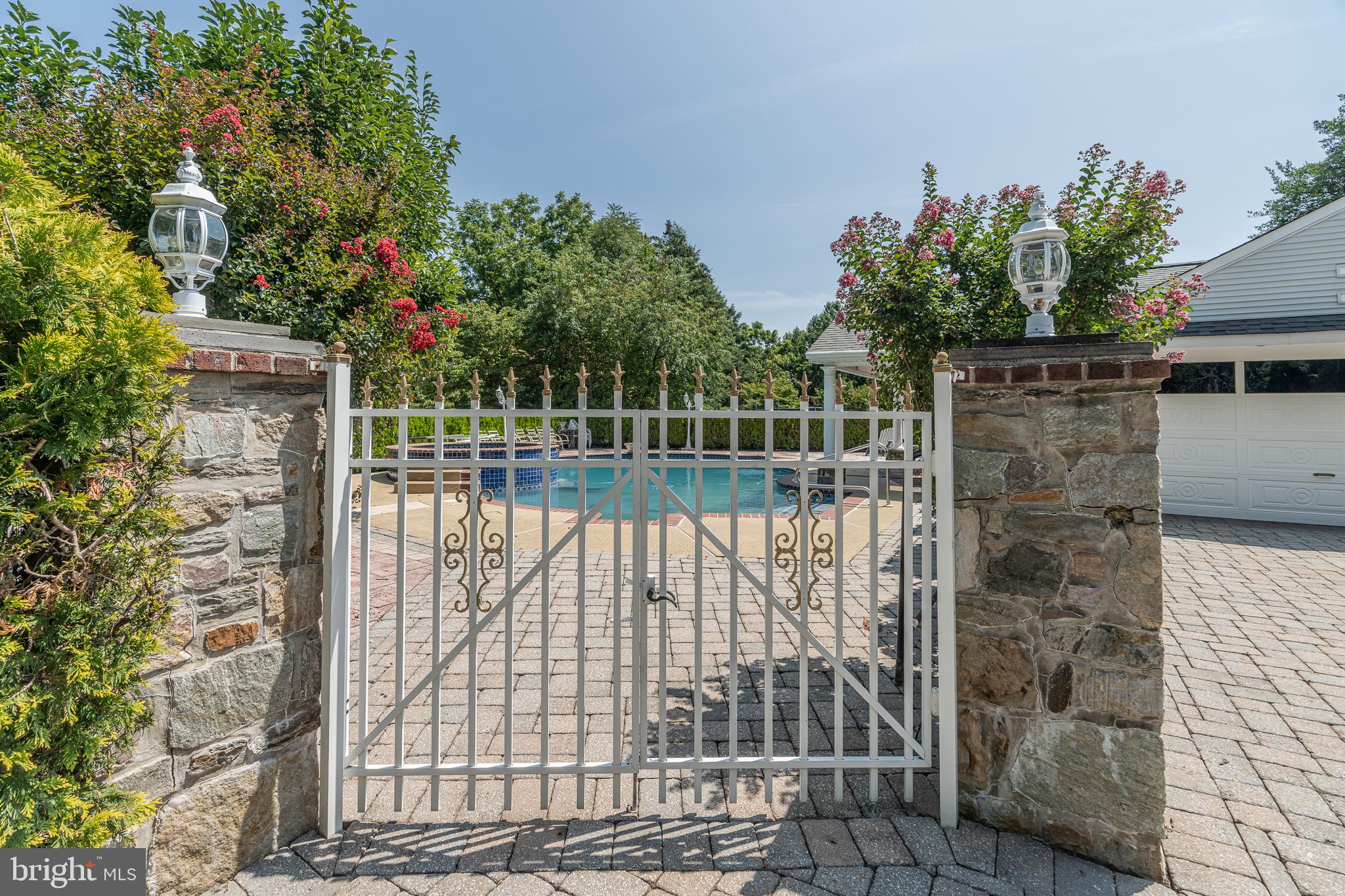 2451 High Road Huntingdon Valley, PA 19006 - Photo 57 of 68 Fence from the driveway to Pool