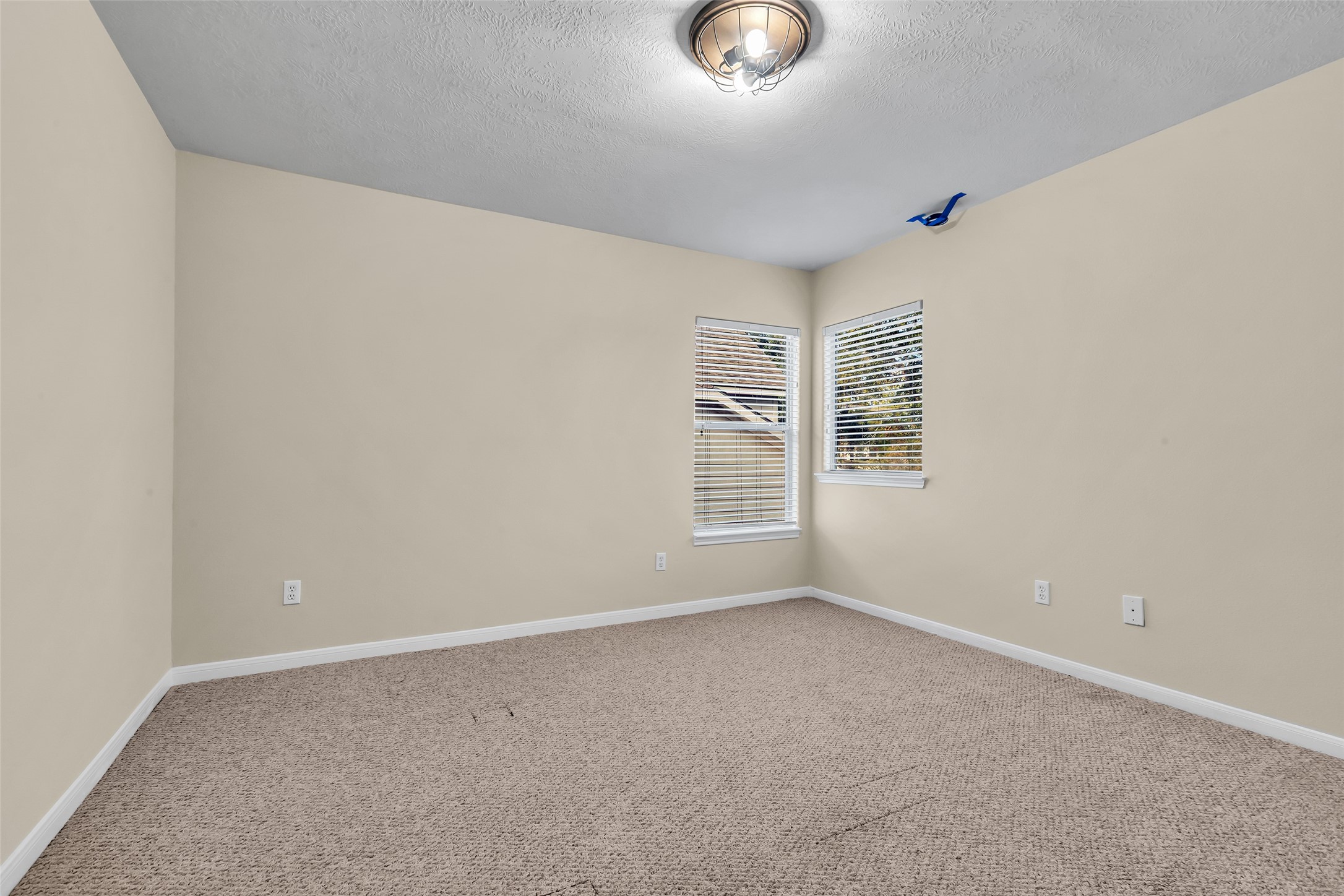 24823 Corbin Gate Drive Spring, TX 77389 - Photo 22 of 25 an empty room with windows