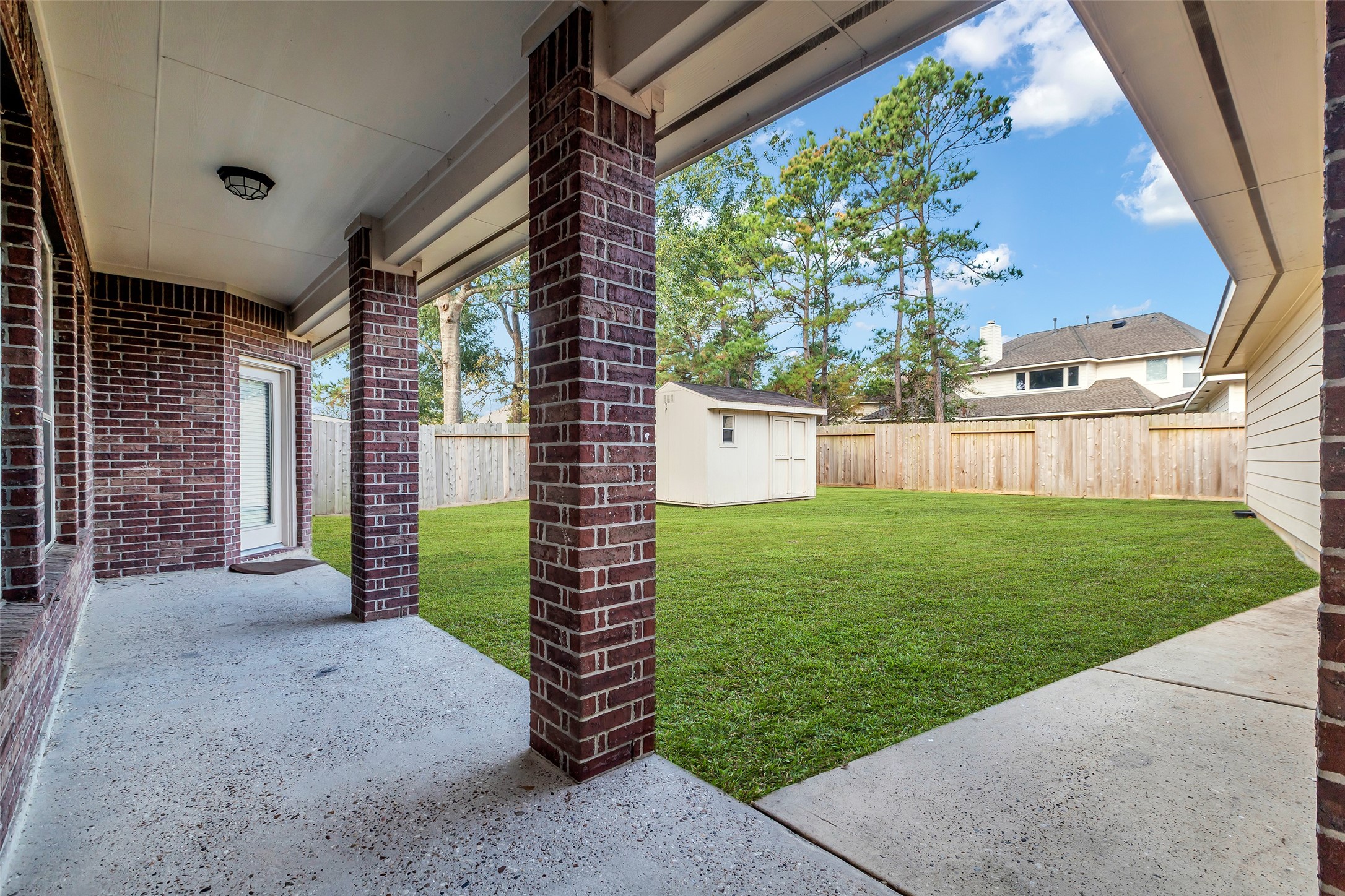 24823 Corbin Gate Drive Spring, TX 77389 - Photo 24 of 25 a view of a backyard with plants