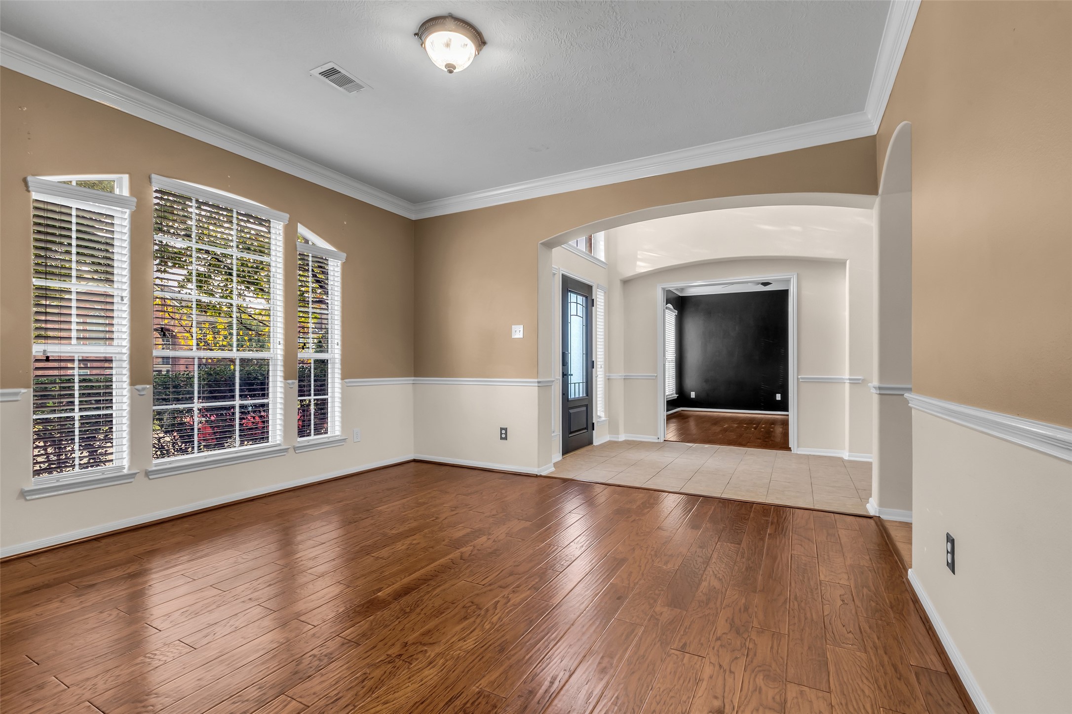 24823 Corbin Gate Drive Spring, TX 77389 - Photo 6 of 25 wooden floor in an empty room with a window