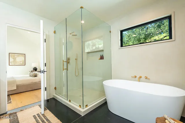 a white bath tub sitting in a bathroom