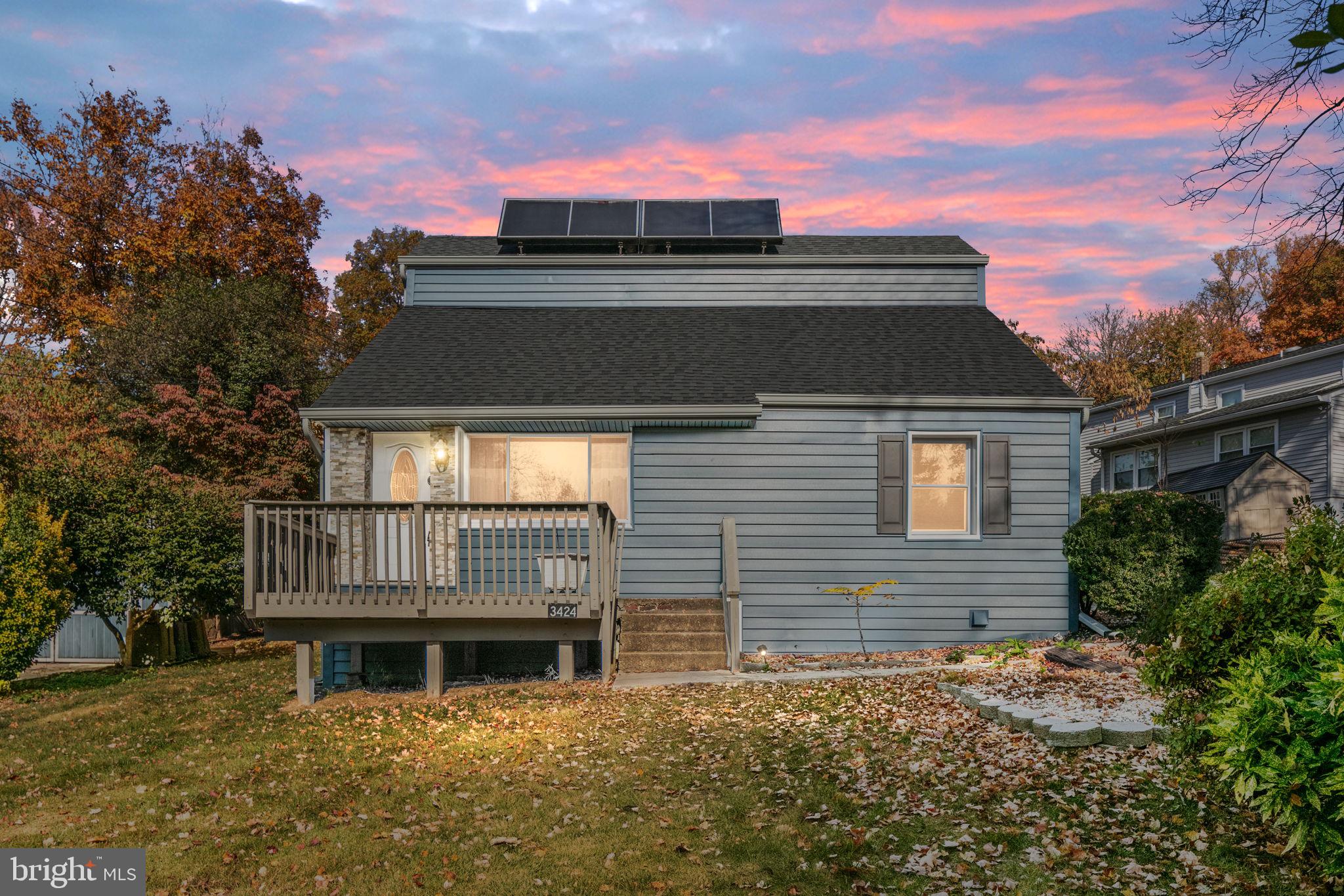 3424 Spring Drive Alexandria, VA 22306 - Photo 1 of 52 a front view of a house with a yard