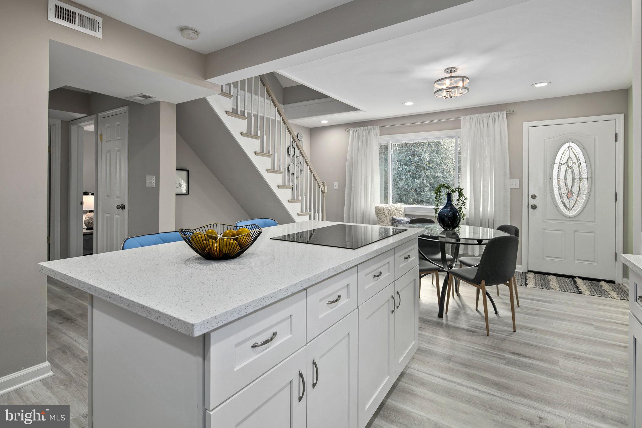 3424 Spring Drive Alexandria, VA 22306 - Photo 18 of 52 a view of dining table chairs and wooden floor