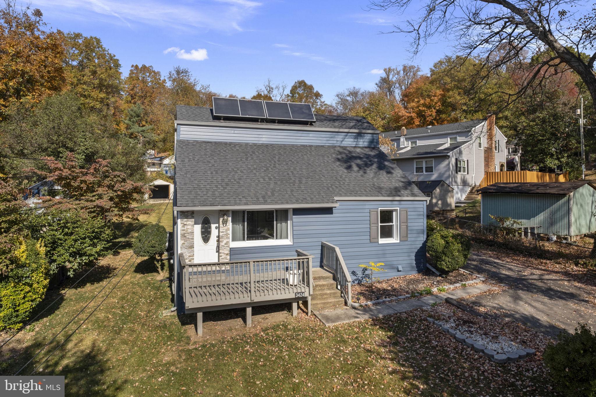 3424 Spring Drive Alexandria, VA 22306 - Photo 2 of 52 a view of a house with a yard and roof deck