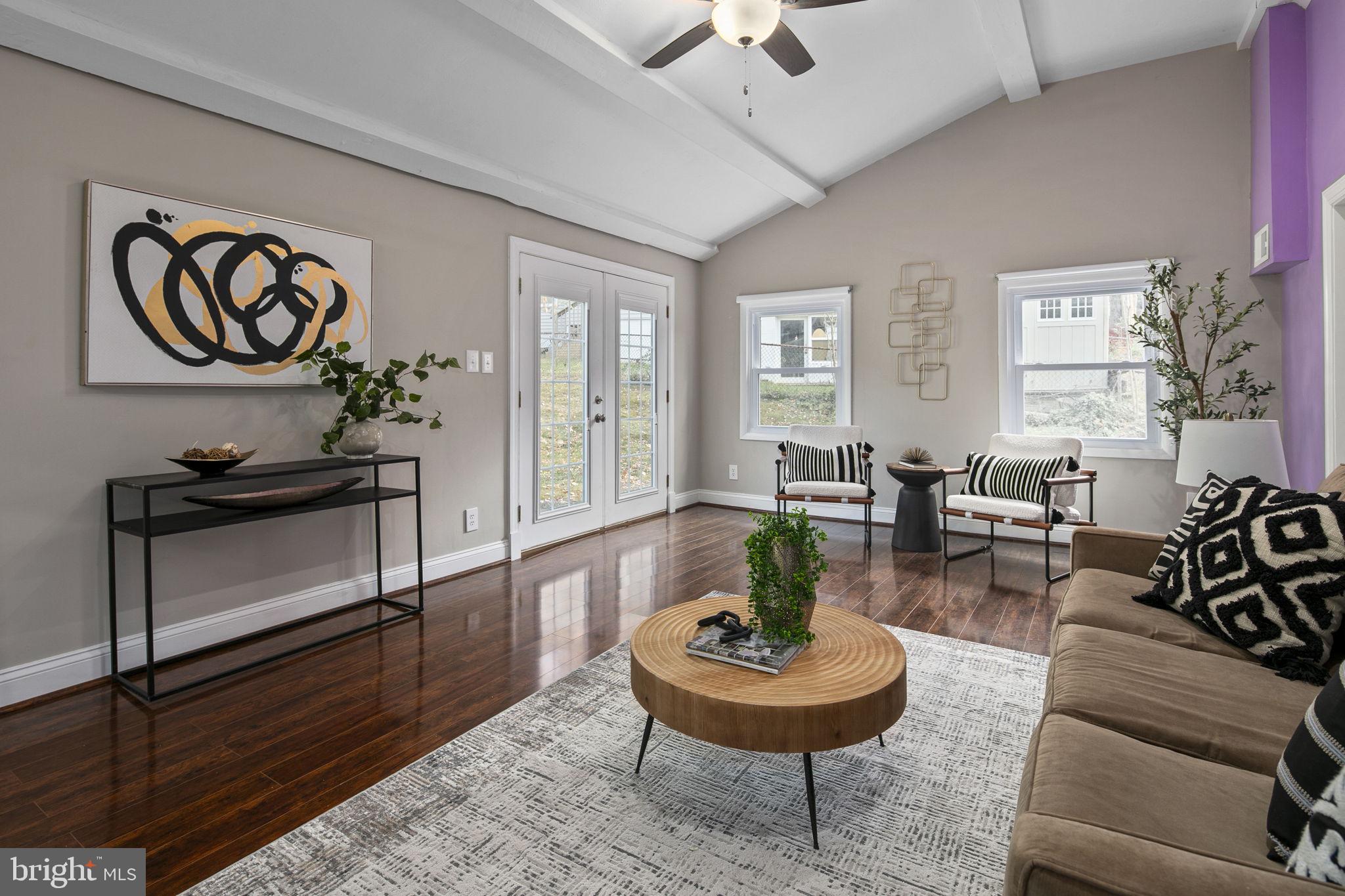 3424 Spring Drive Alexandria, VA 22306 - Photo 23 of 52 a living room with furniture and a wooden floor