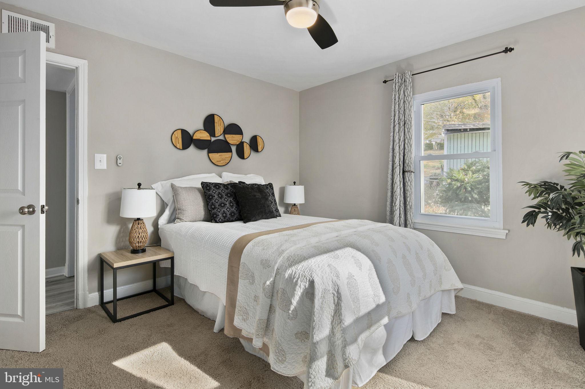 3424 Spring Drive Alexandria, VA 22306 - Photo 33 of 52 a bedroom with a bed and window