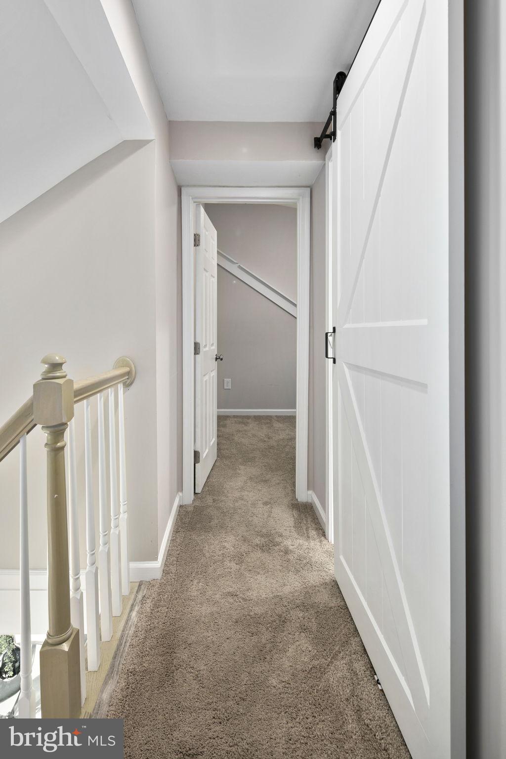 3424 Spring Drive Alexandria, VA 22306 - Photo 35 of 52 a view of a hallway with wooden floor and entryway