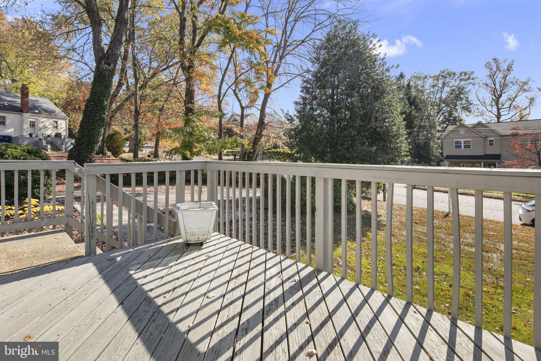 3424 Spring Drive Alexandria, VA 22306 - Photo 5 of 52 a view of balcony with wooden floor and fence