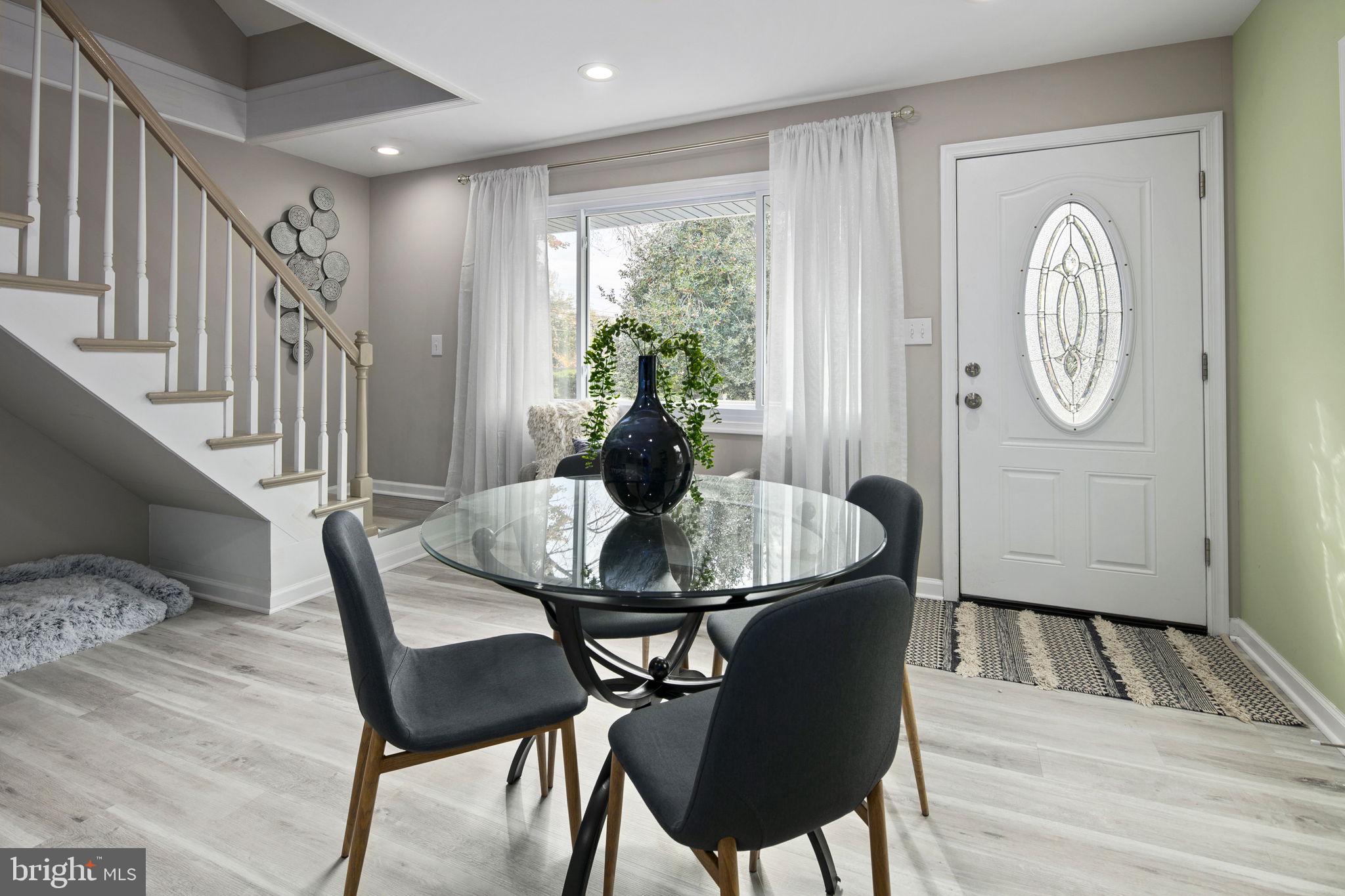 3424 Spring Drive Alexandria, VA 22306 - Photo 7 of 52 a dining room with furniture and wooden floor