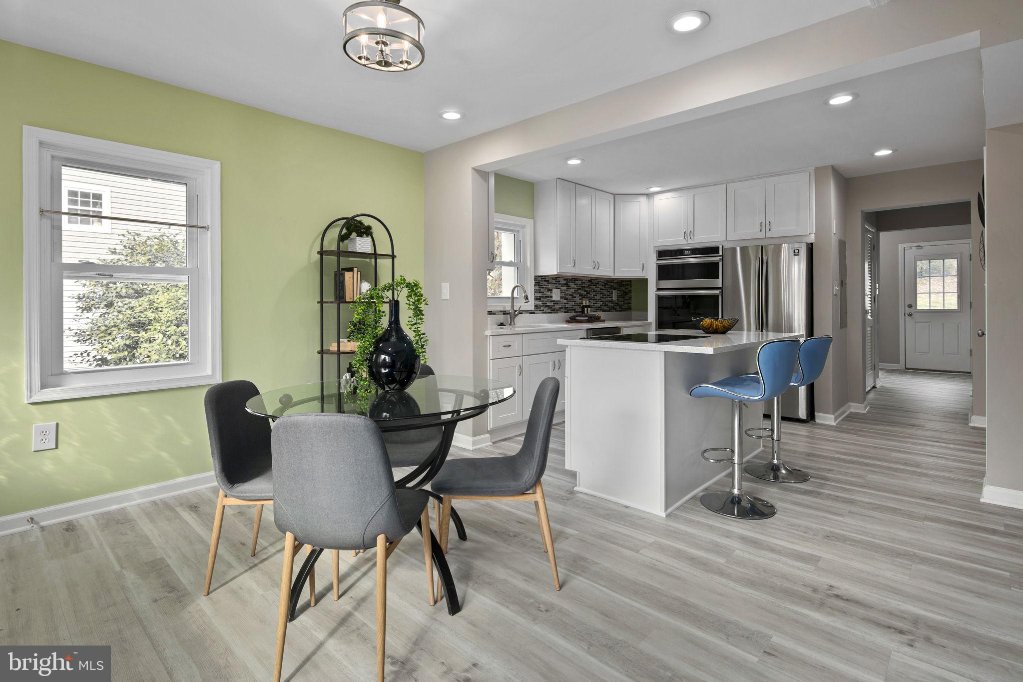 3424 Spring Drive Alexandria, VA 22306 - Photo 10 of 52 a dining room with furniture and wooden floor