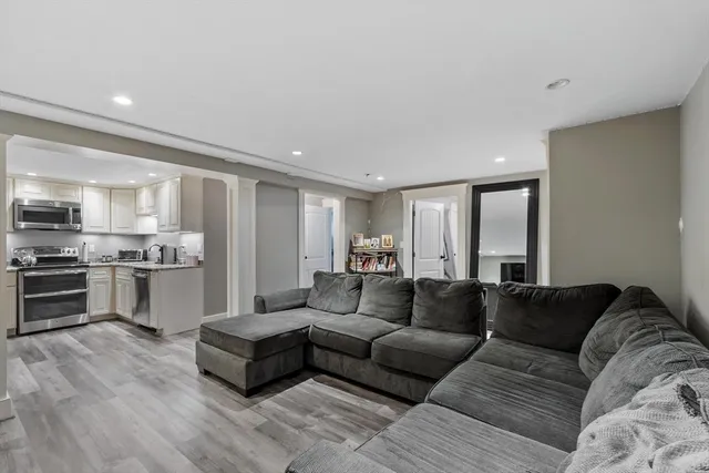 a living room with furniture and a couch