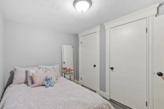 swimming pool view with a seating space