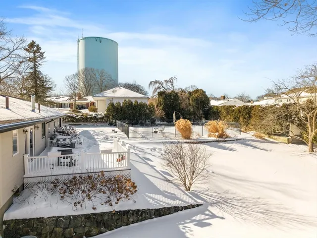 a view of a patio with a yard