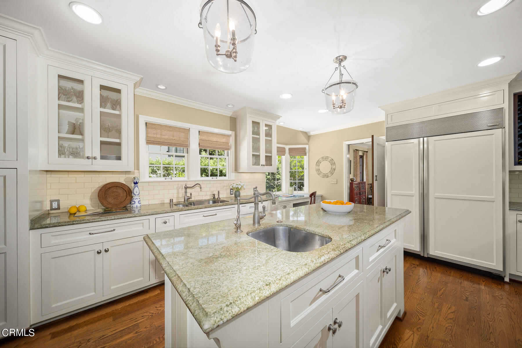 425 Prospect Circle South Pasadena, CA 91030 - Photo 7 of 19 a kitchen with a sink a center island cabinets and a window