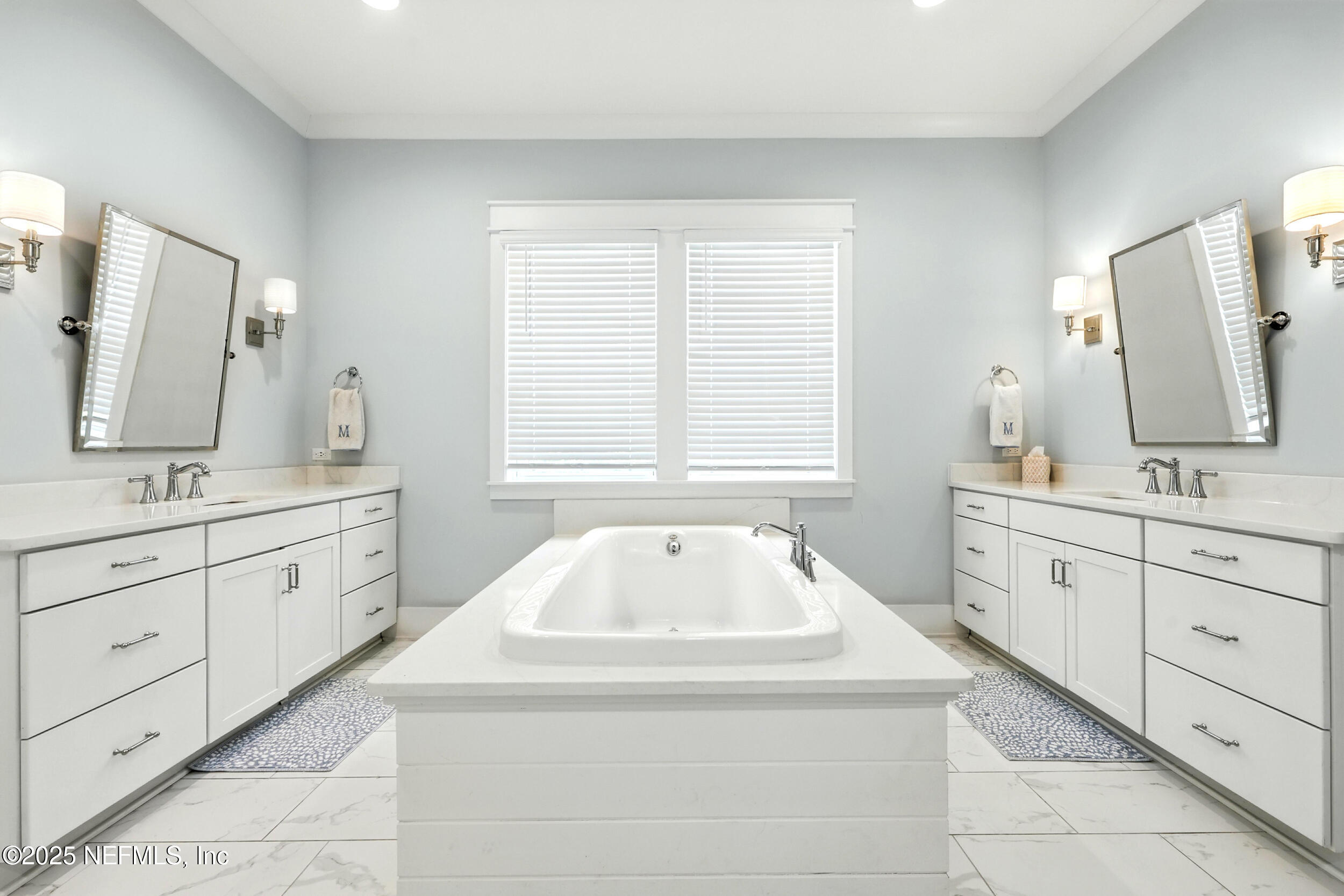 116 Palm Bay Court Ponte Vedra Beach, FL 32082 - Photo 26 of 60 a spacious bathroom with a tub sink and mirror
