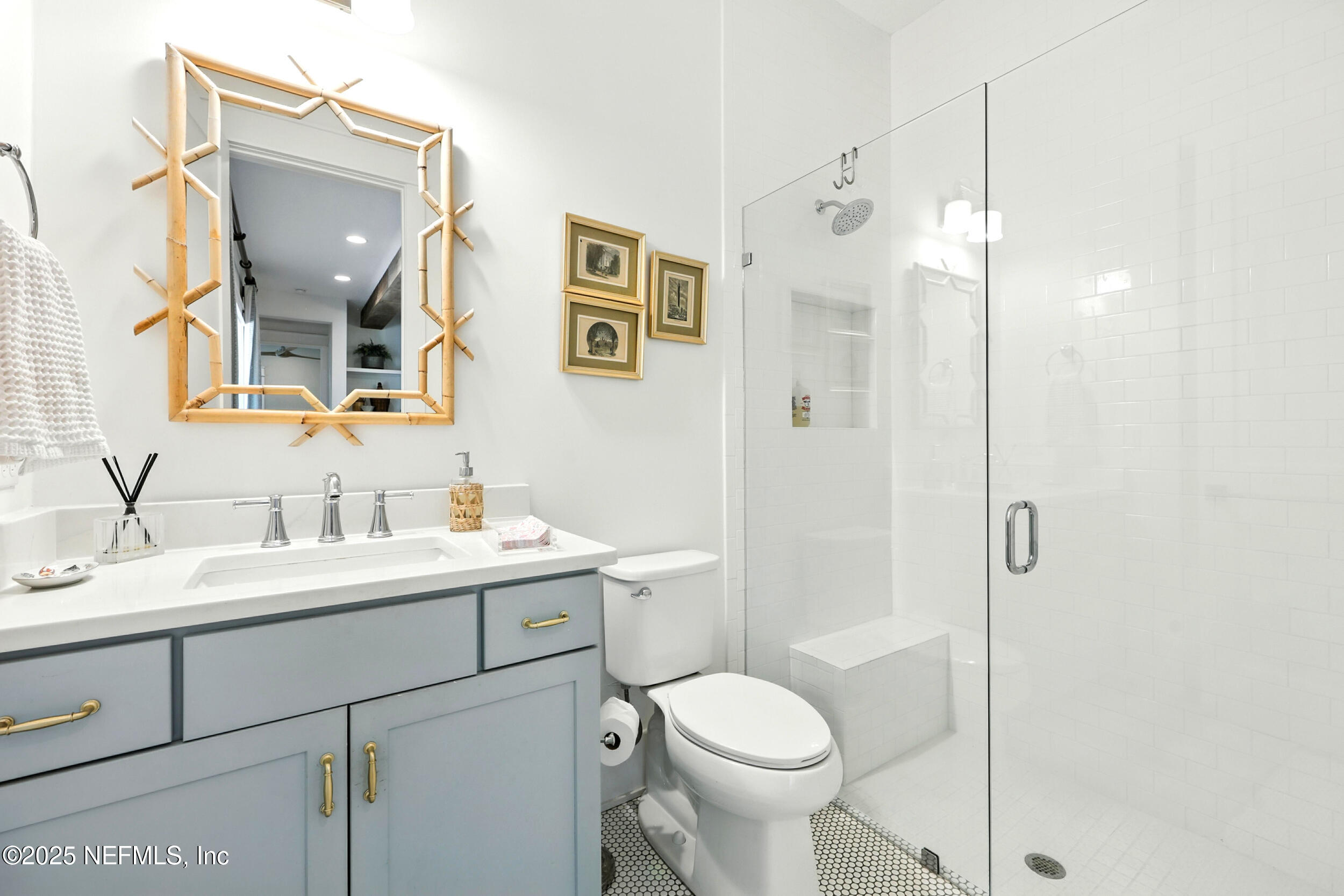 116 Palm Bay Court Ponte Vedra Beach, FL 32082 - Photo 27 of 60 a bathroom with a toilet sink shower and mirror