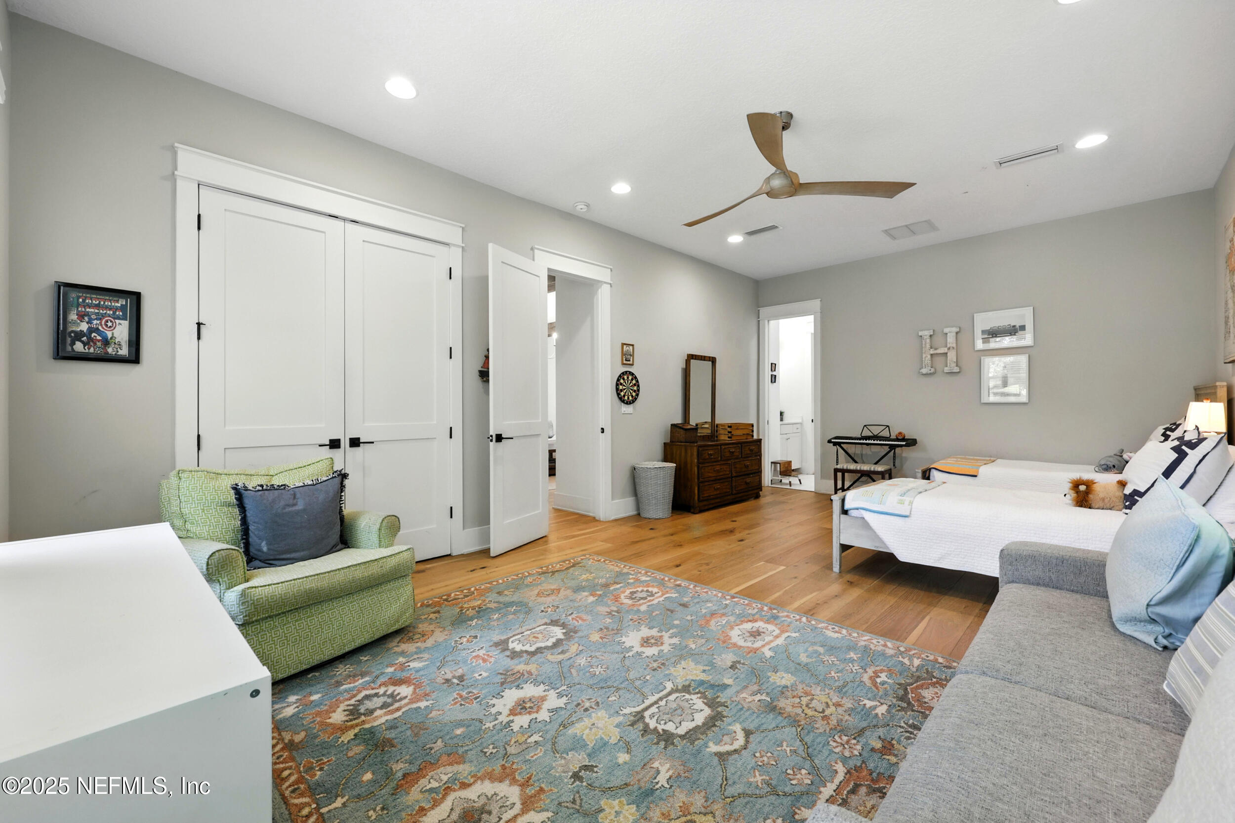116 Palm Bay Court Ponte Vedra Beach, FL 32082 - Photo 29 of 60 a bedroom with furniture and a wooden floor