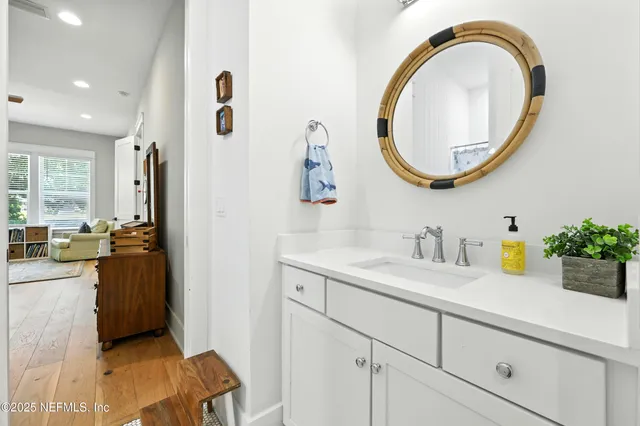 a bedroom with a bed and a desk