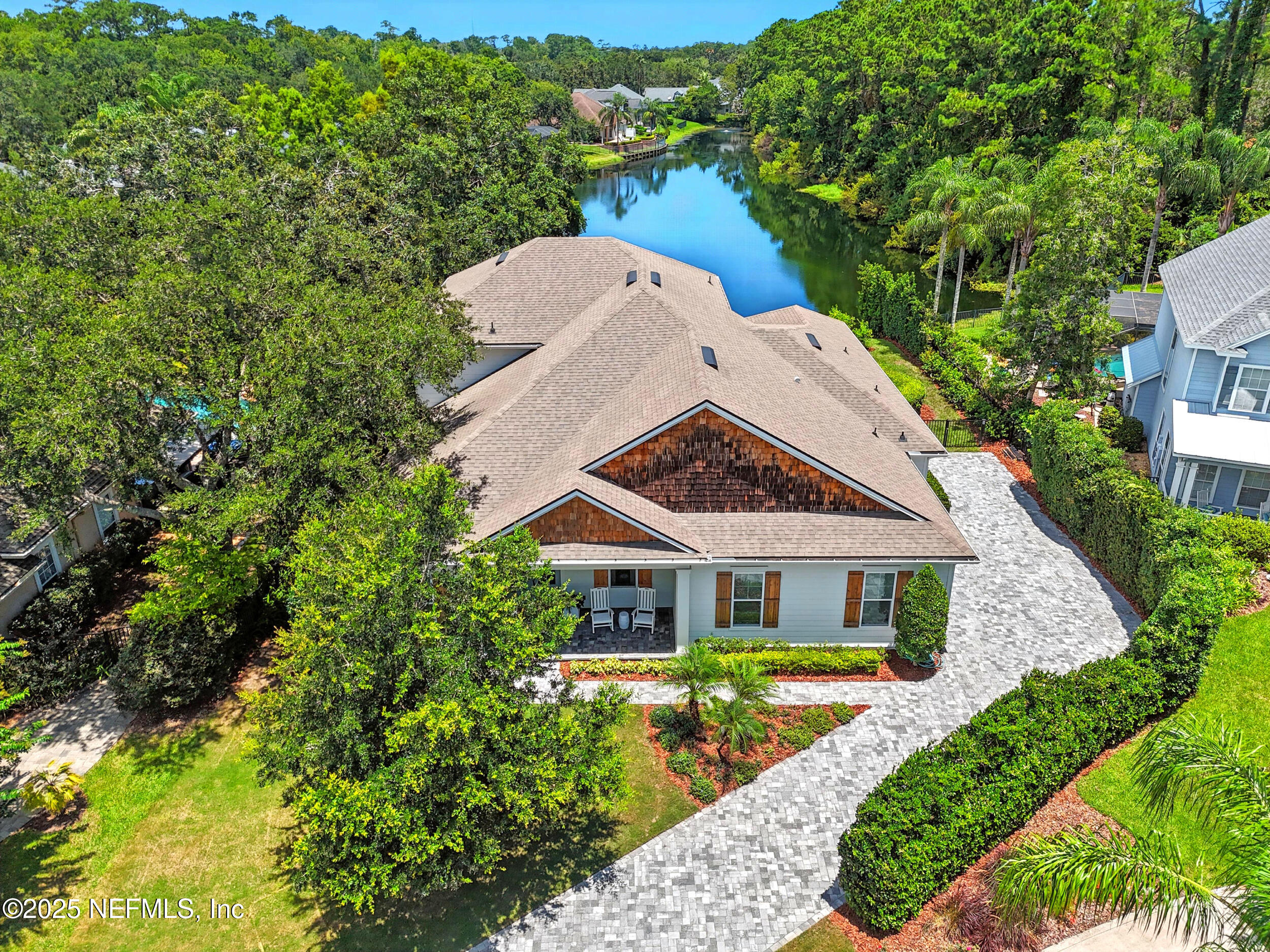 116 Palm Bay Court Ponte Vedra Beach, FL 32082 - Photo 3 of 60 a front view of a house with garden