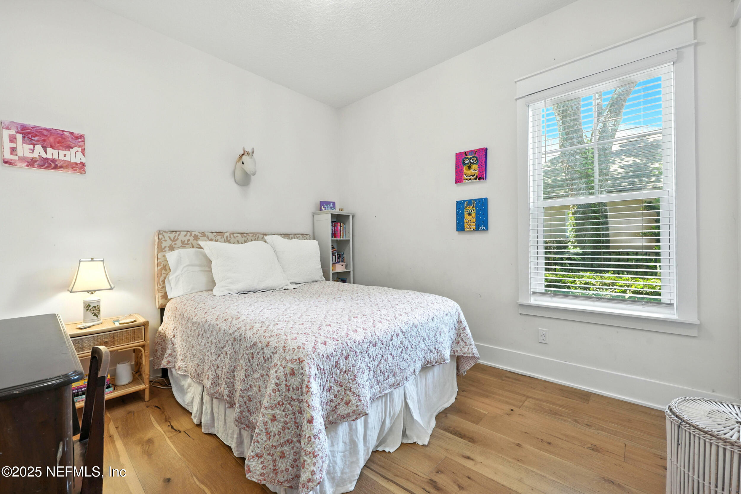 116 Palm Bay Court Ponte Vedra Beach, FL 32082 - Photo 32 of 60 a bedroom with a bed and wooden floor