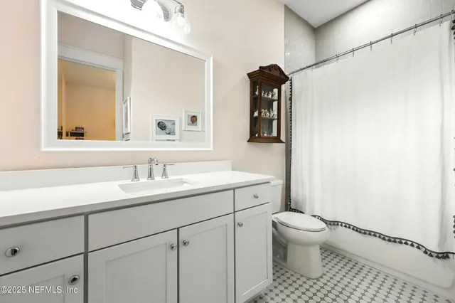 a outdoor space with a couch and chairs