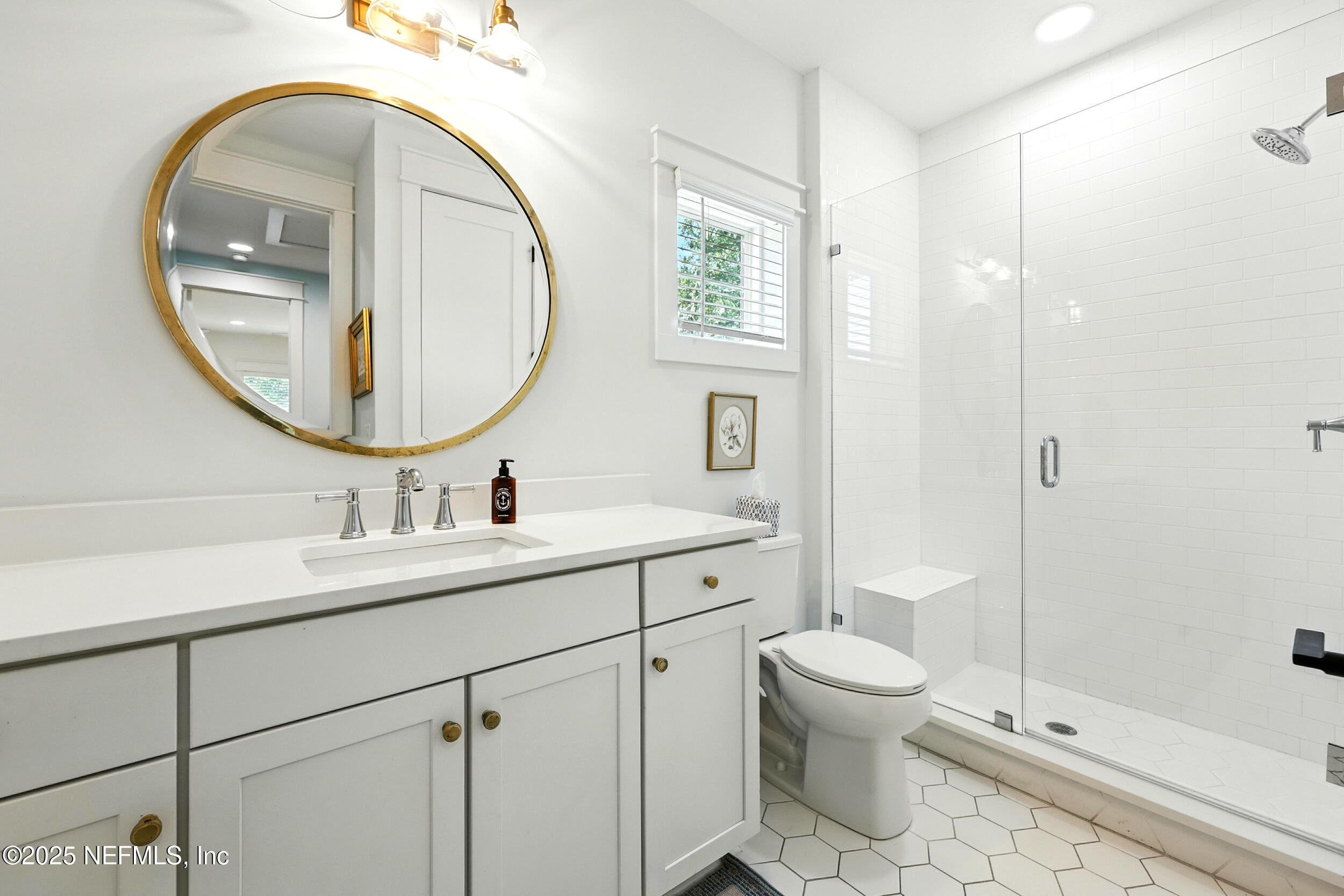 116 Palm Bay Court Ponte Vedra Beach, FL 32082 - Photo 37 of 60 a bathroom with a toilet a sink and mirror