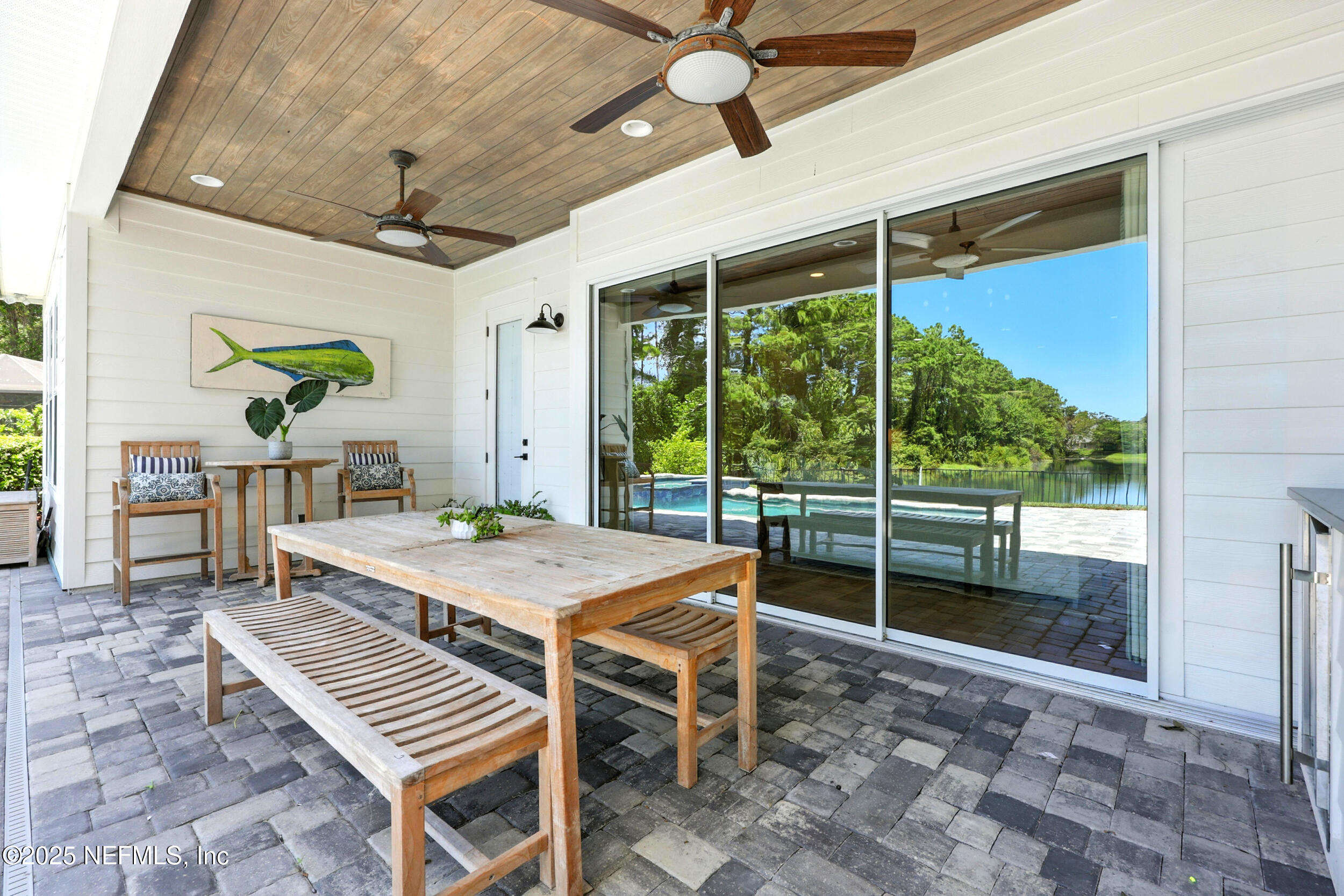 116 Palm Bay Court Ponte Vedra Beach, FL 32082 - Photo 40 of 60 a view of a dining room with furniture window and wooden floor