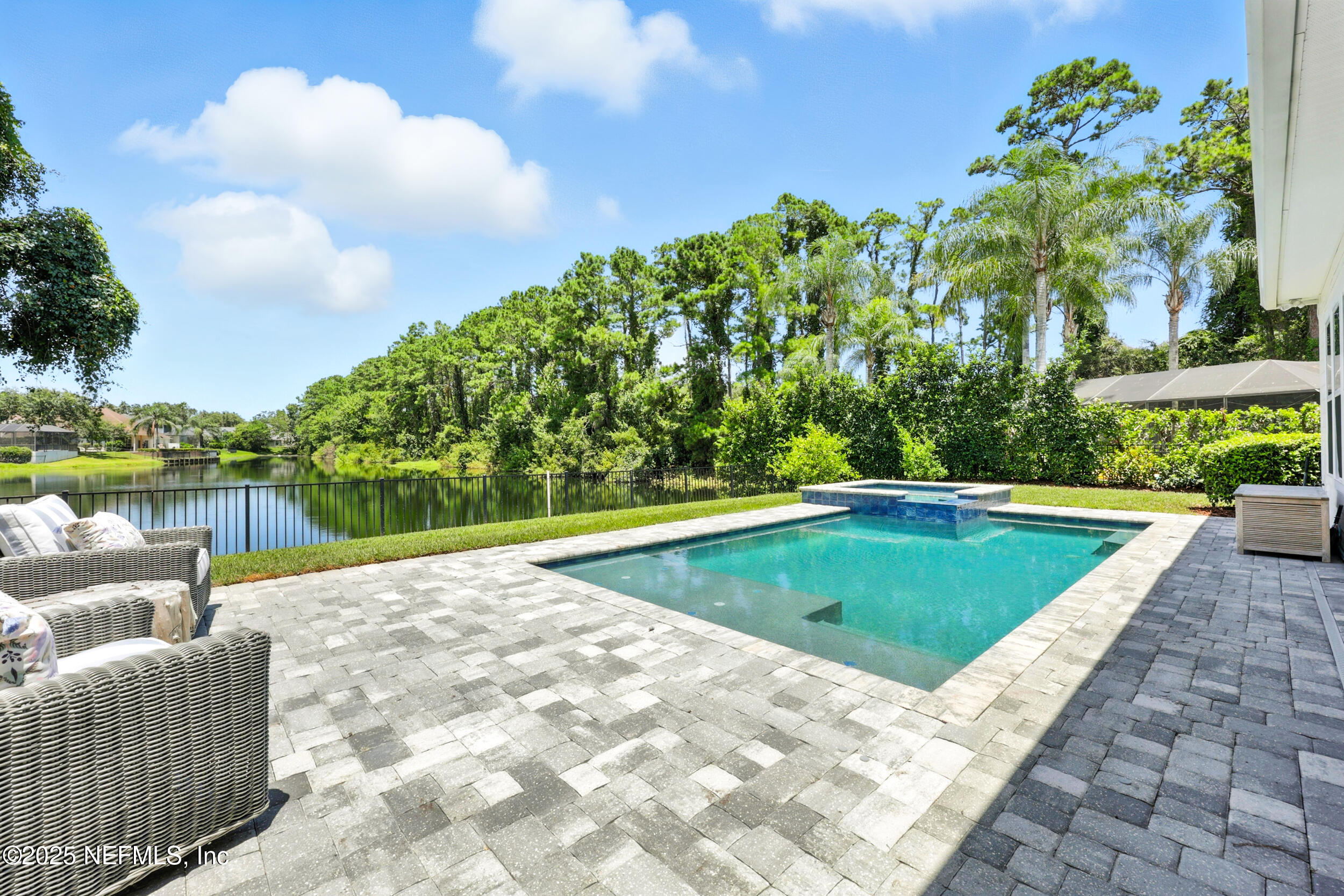 116 Palm Bay Court Ponte Vedra Beach, FL 32082 - Photo 41 of 60 a view of a swimming pool with a lounge chairs