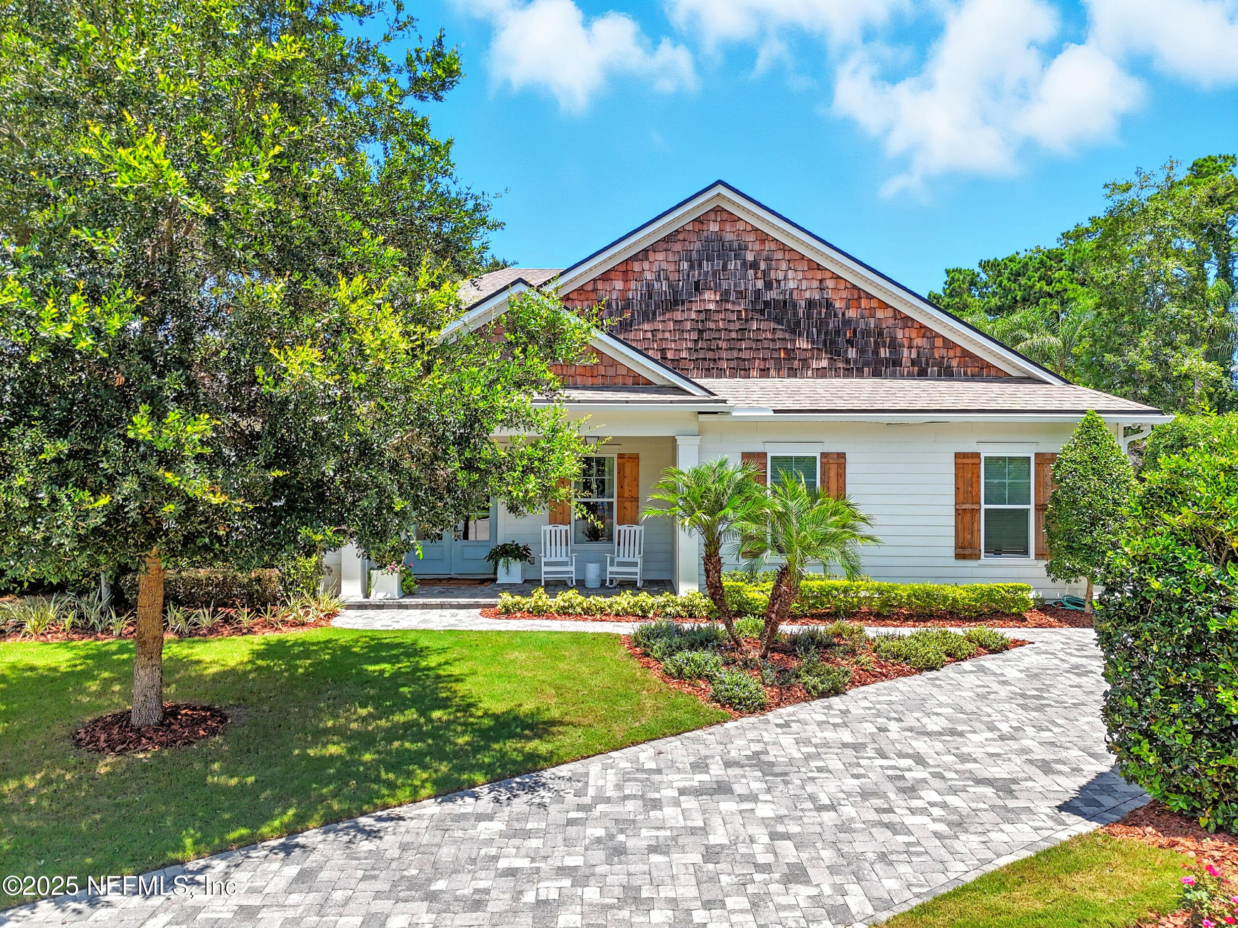 116 Palm Bay Court Ponte Vedra Beach, FL 32082 - Photo 50 of 60 a front view of a house with a yard
