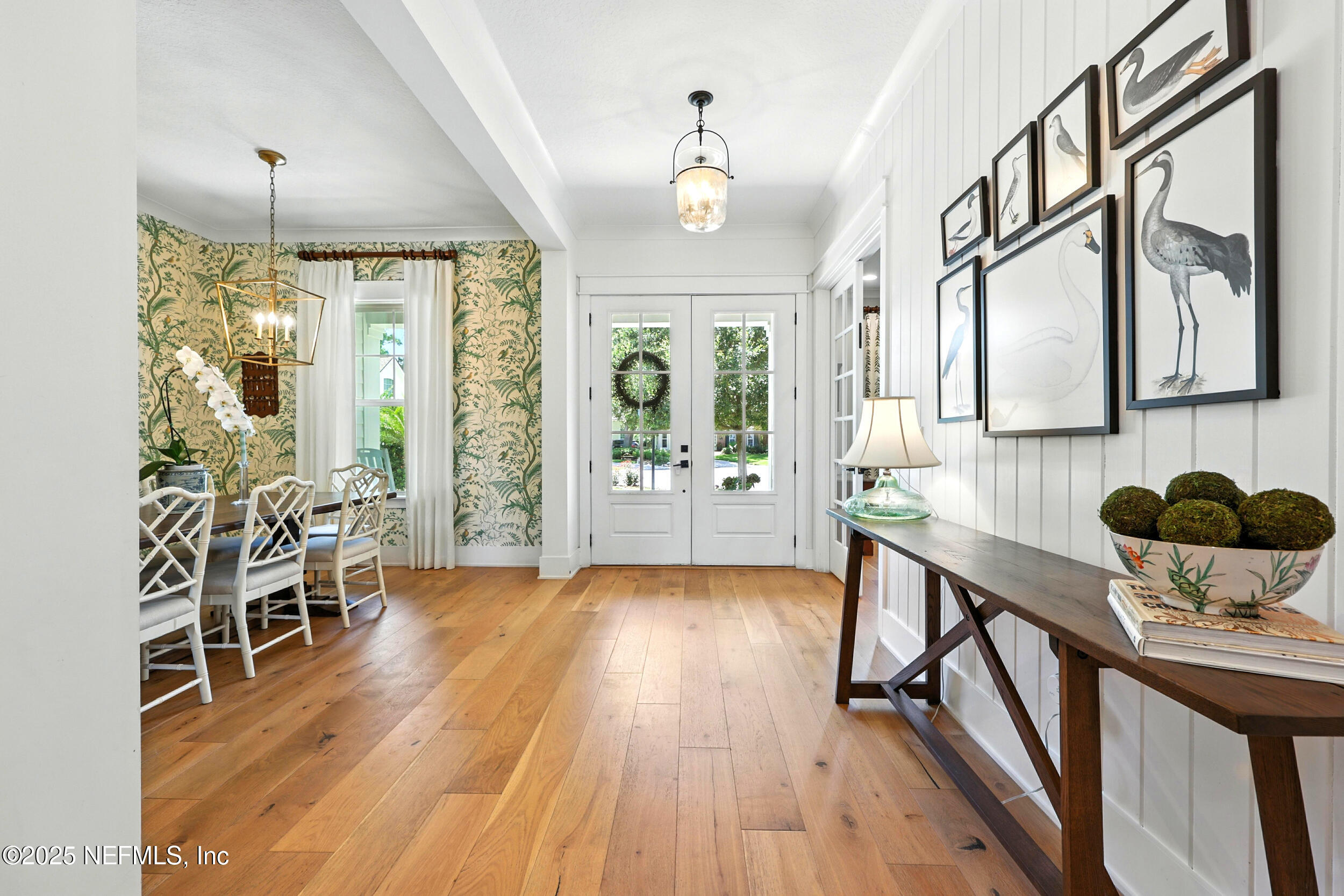 116 Palm Bay Court Ponte Vedra Beach, FL 32082 - Photo 5 of 60 a view of a dining room with furniture window and wooden floor