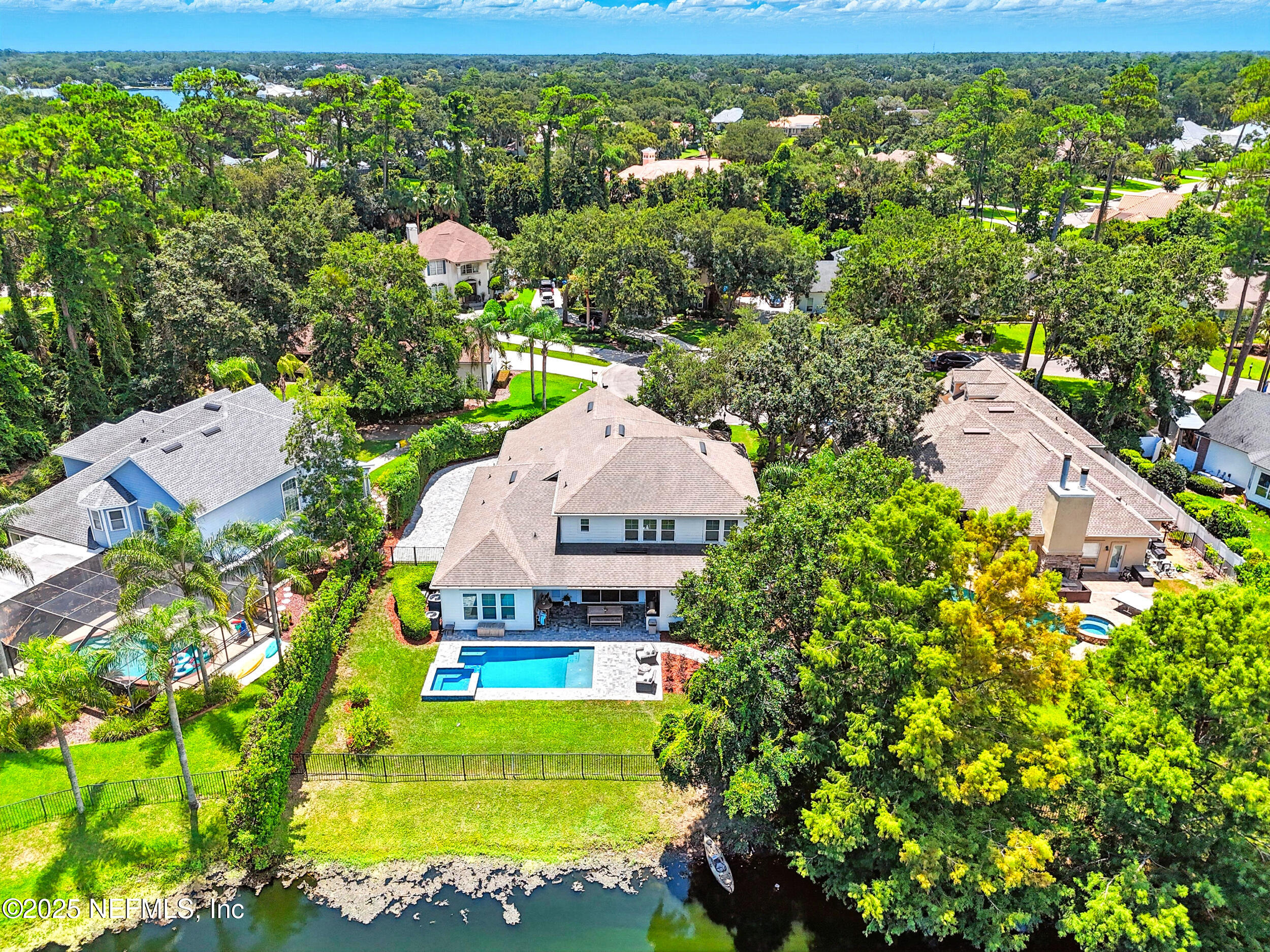 116 Palm Bay Court Ponte Vedra Beach, FL 32082 - Photo 53 of 60 a view of a large garden with plants and large trees