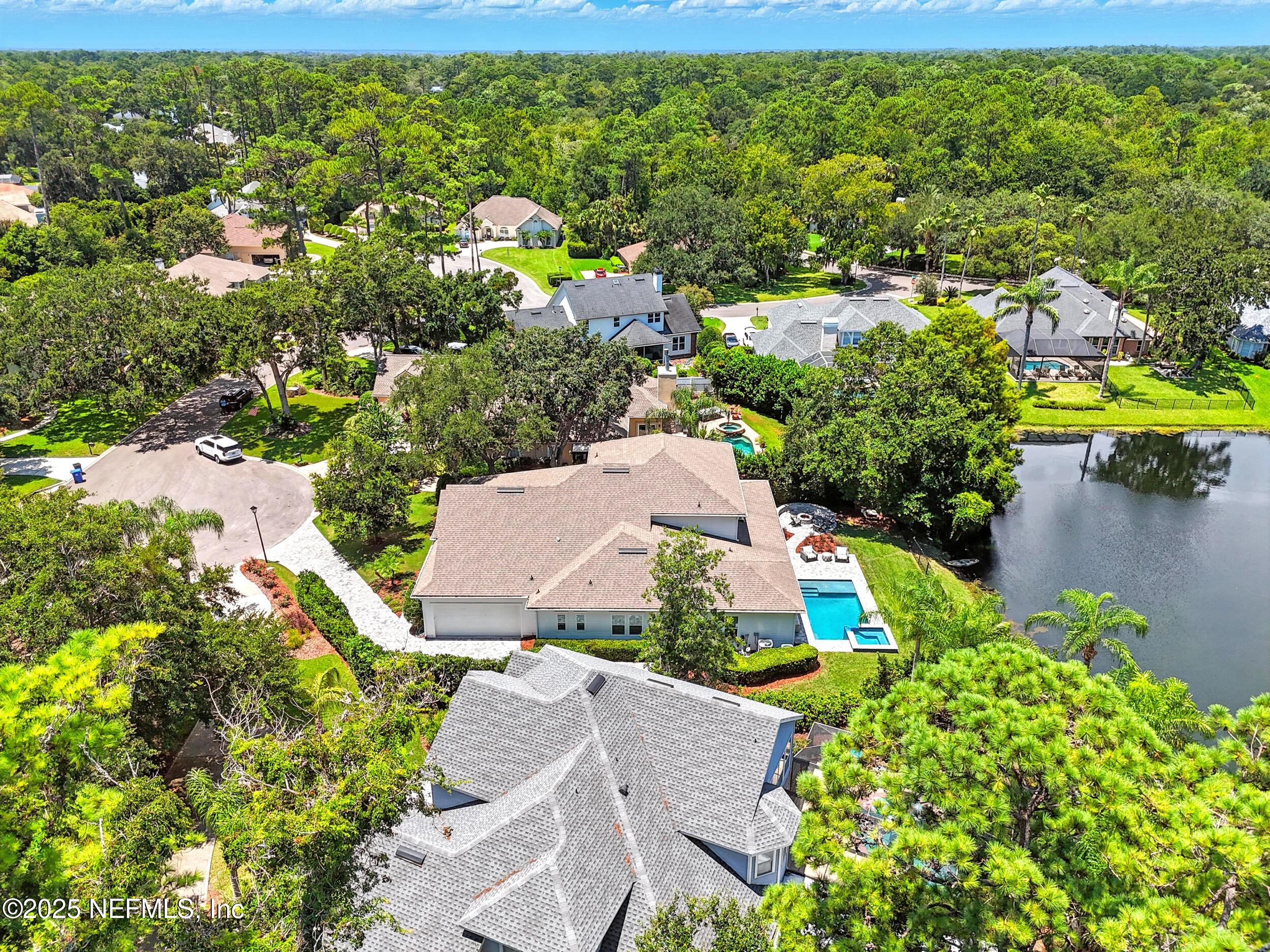 116 Palm Bay Court Ponte Vedra Beach, FL 32082 - Photo 55 of 60 an aerial view of a house with a yard