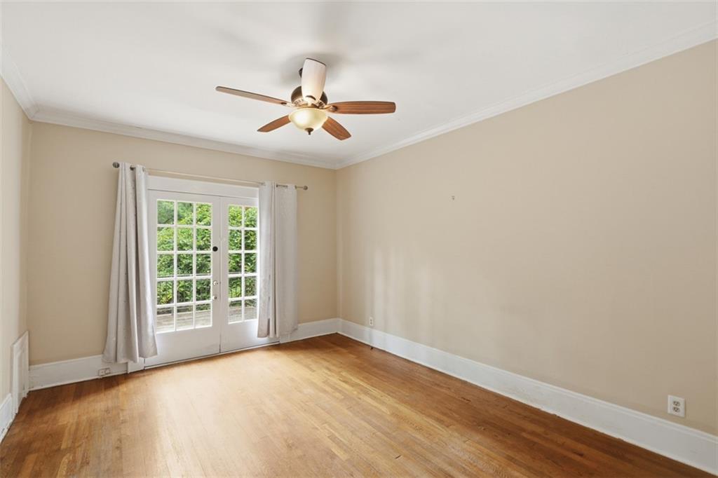 1424 Emory Road Northeast Atlanta, GA 30306 - Photo 25 of 36 a view of an empty room with a window