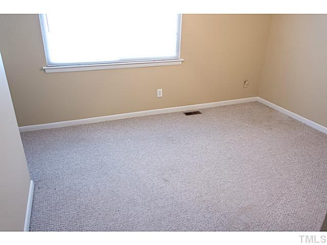 5814 Shady Grove Circle Raleigh, NC 27609 - Photo 11 of 15 a view of an empty room