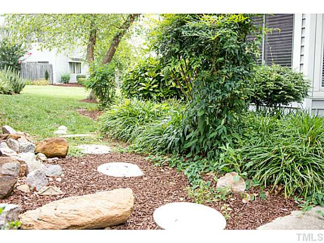 5814 Shady Grove Circle Raleigh, NC 27609 - Photo 14 of 15 a view of a backyard of the house
