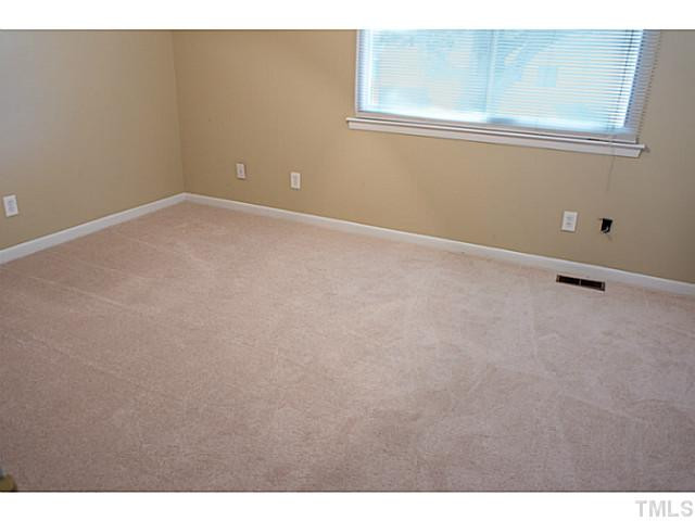5814 Shady Grove Circle Raleigh, NC 27609 - Photo 10 of 15 a view of an empty room