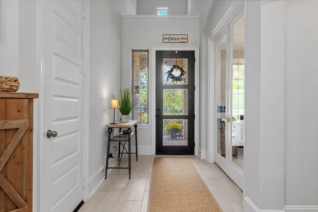 a view of livingroom with furniture and windows