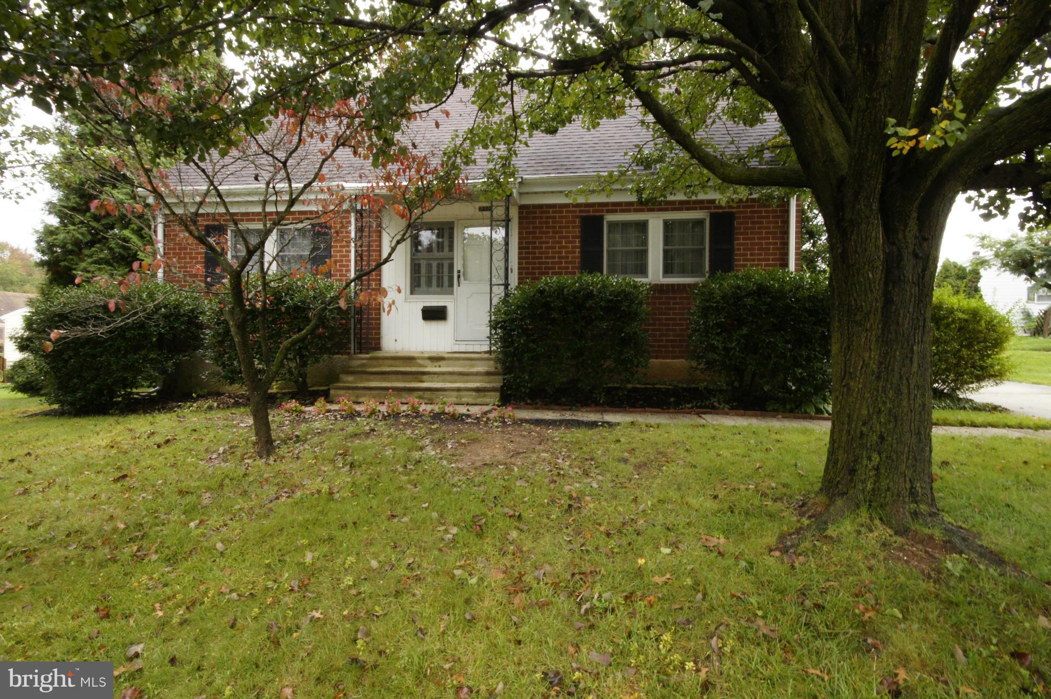 6202 Gilston Park Road Baltimore, MD 21228 - Photo 1 of 21 a house view with a garden space