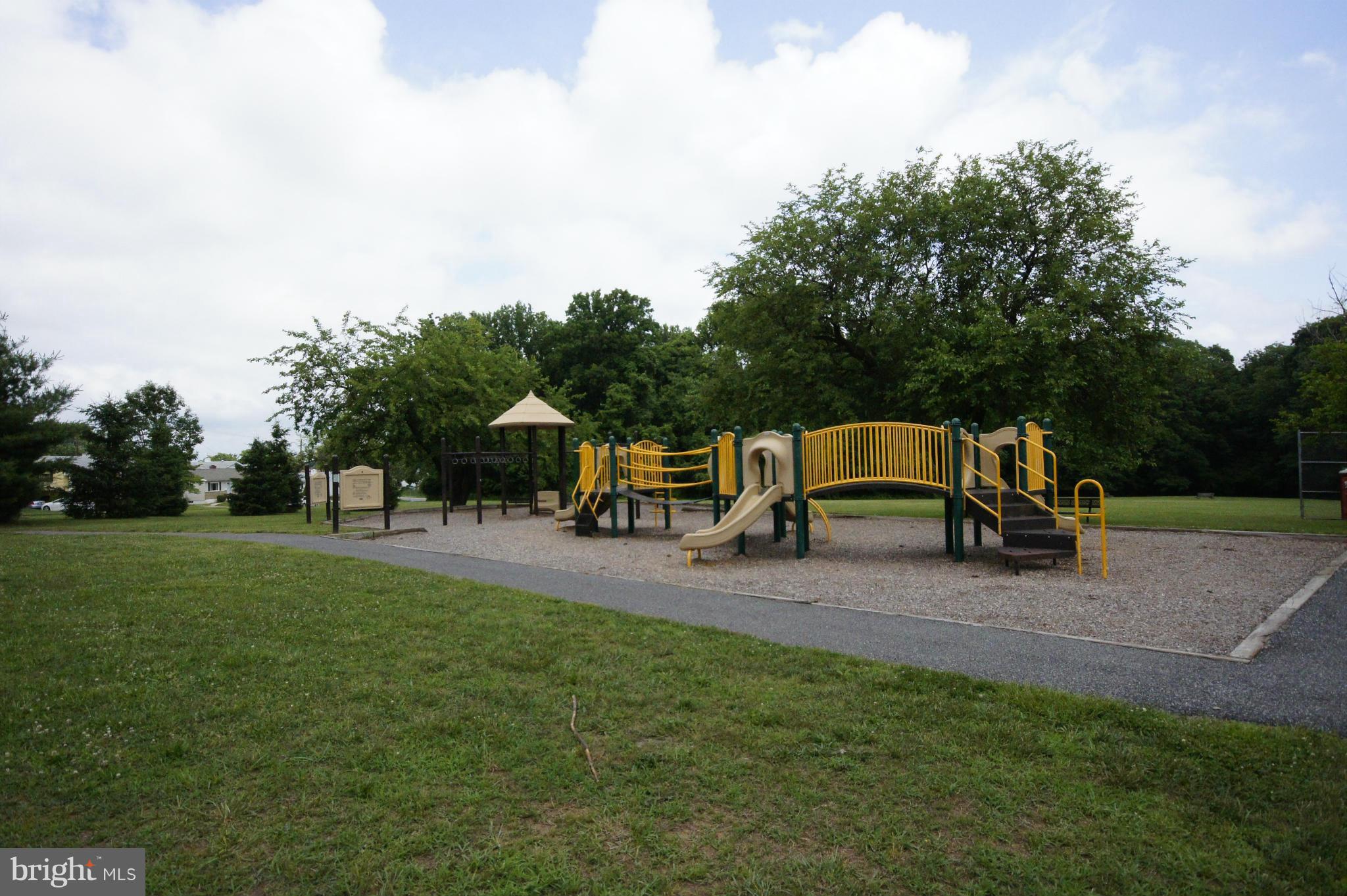 6202 Gilston Park Road Baltimore, MD 21228 - Photo 20 of 21 a childrens park with lots of swings and slides