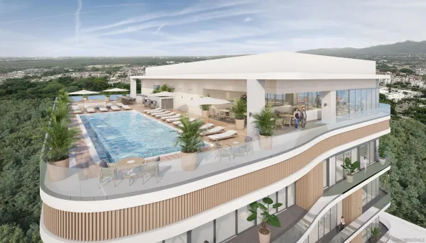 swimming pool view with a seating space