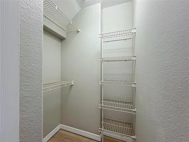 a bathroom with a shower and a toilet