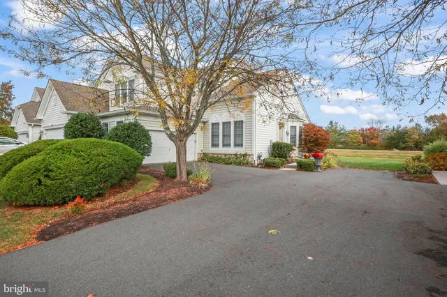 a view of a house with a street