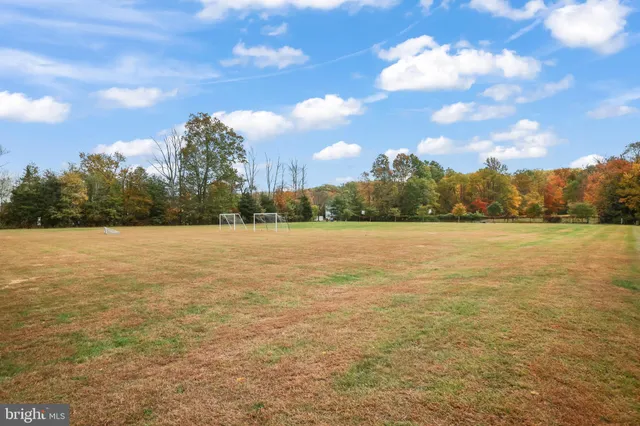 a view of lake with sunset
