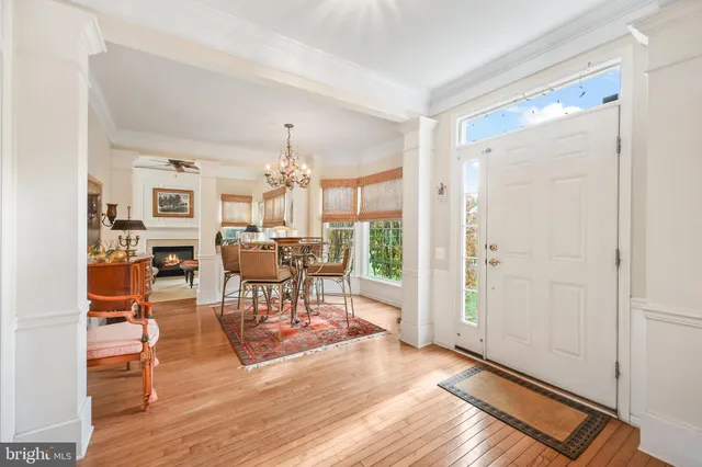 a view of a livingroom with furniture window and wooden floor
