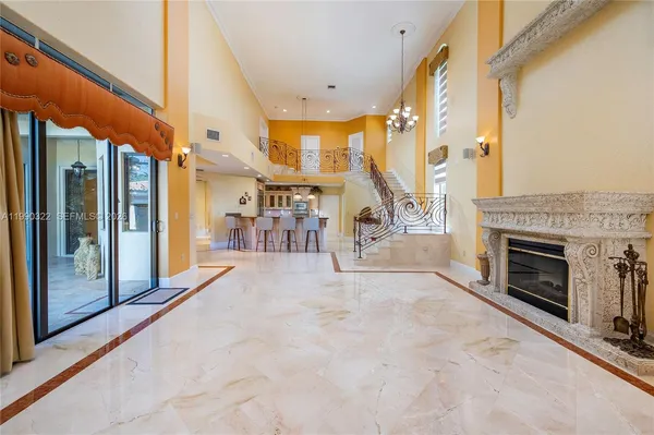 a view of a livingroom with furniture window and wooden floor