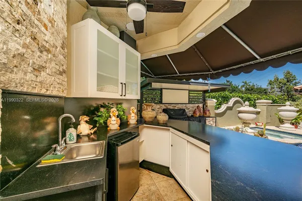 a vase with flowers sitting on a table